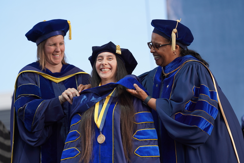 UC Merced graduate on graduation day
